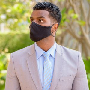 african-businessman-with-face-mask-for-protection-2021-08-31-09-32-21-utc.jpg